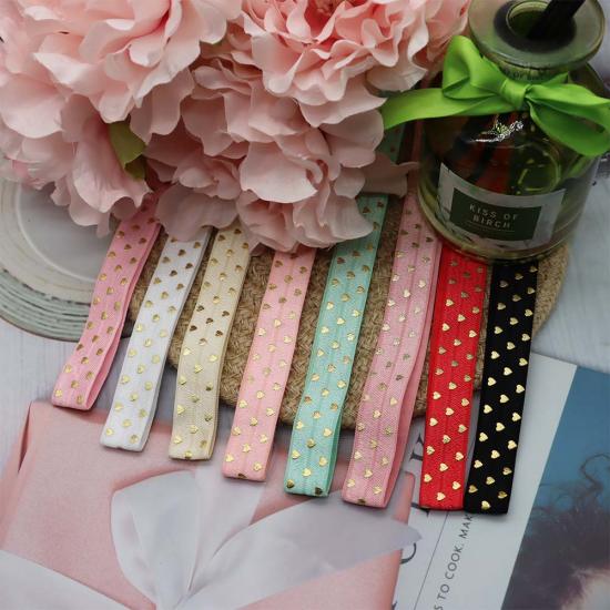 Gold hearts printed fold over elastic ribbon